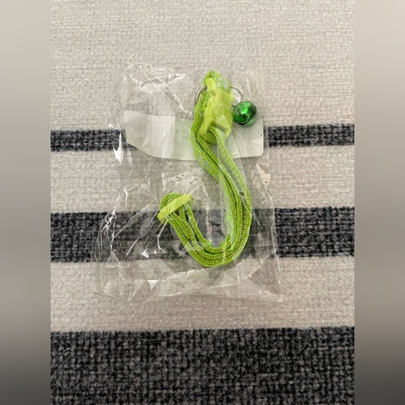 Collar with White Paw Print Pattern and Matching Bell and Buckle - Picture 15 of 15